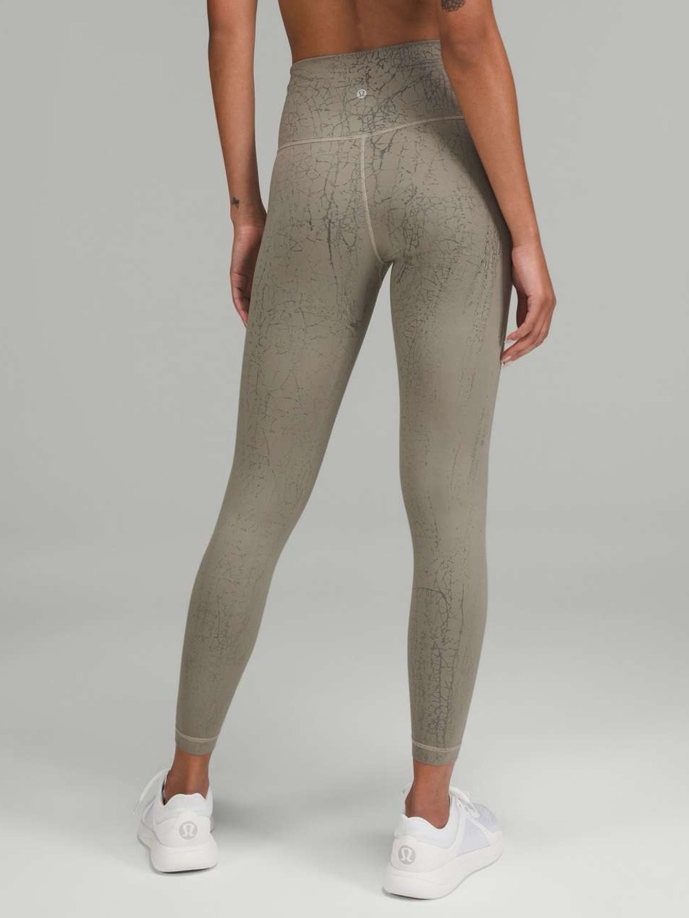 Lululemon Wunder Train High-Rise Tight 25" 
Thread Dye Rover Black. EUC